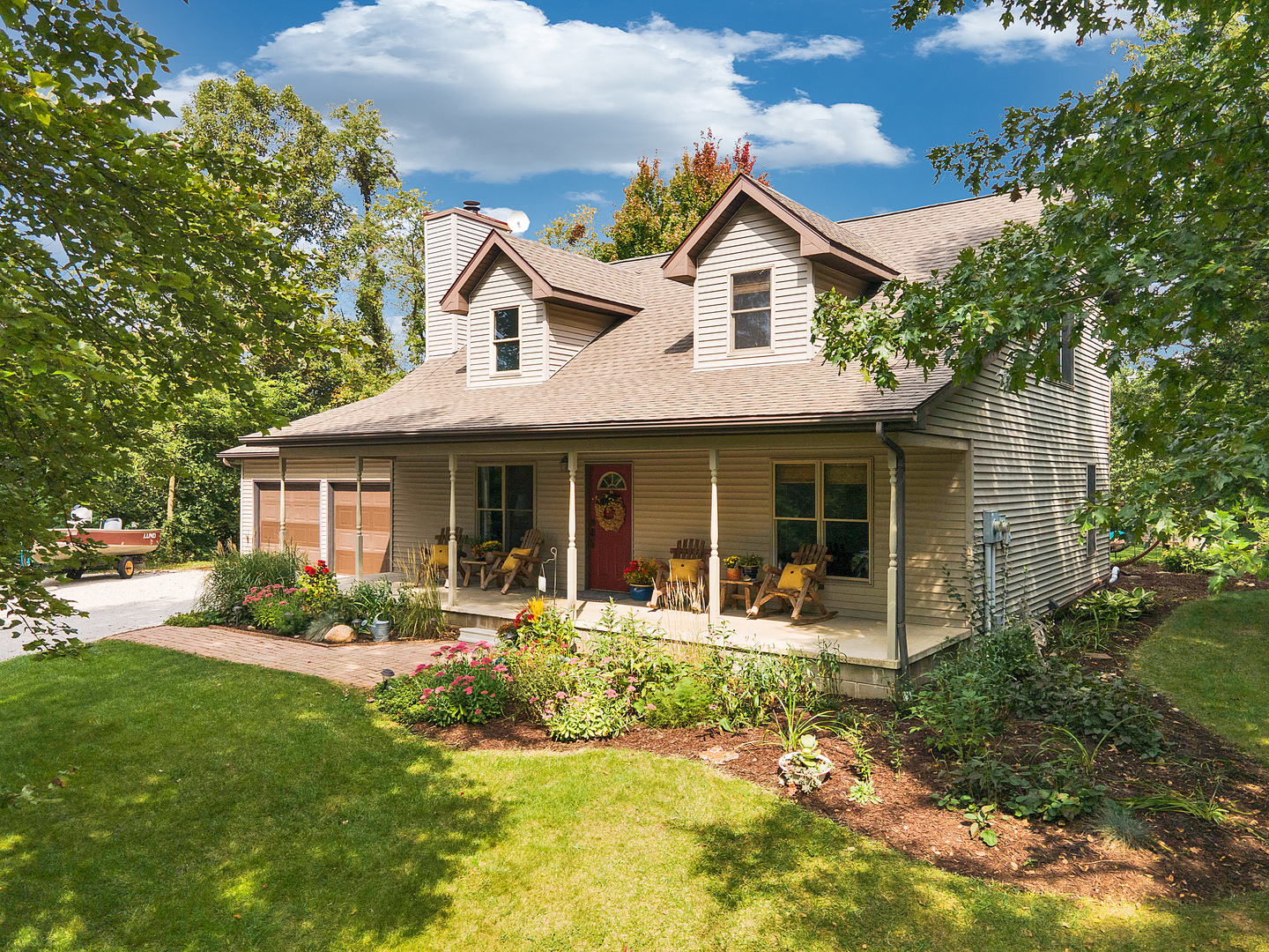 804 Kickapoo Drive Danvers, IL 61732 - Photo 25 of 33 a front view of a house with garden and porch