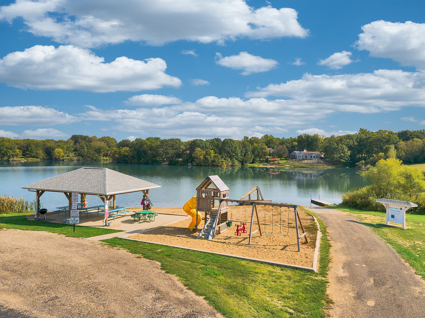 804 Kickapoo Drive Danvers, IL 61732 - Photo 28 of 33 a view of a lake with houses in the back
