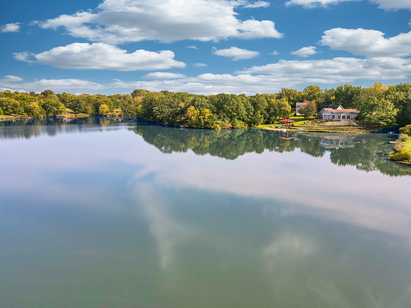 804 Kickapoo Drive Danvers, IL 61732 - Photo 5 of 33 a view of a lake with houses in the back