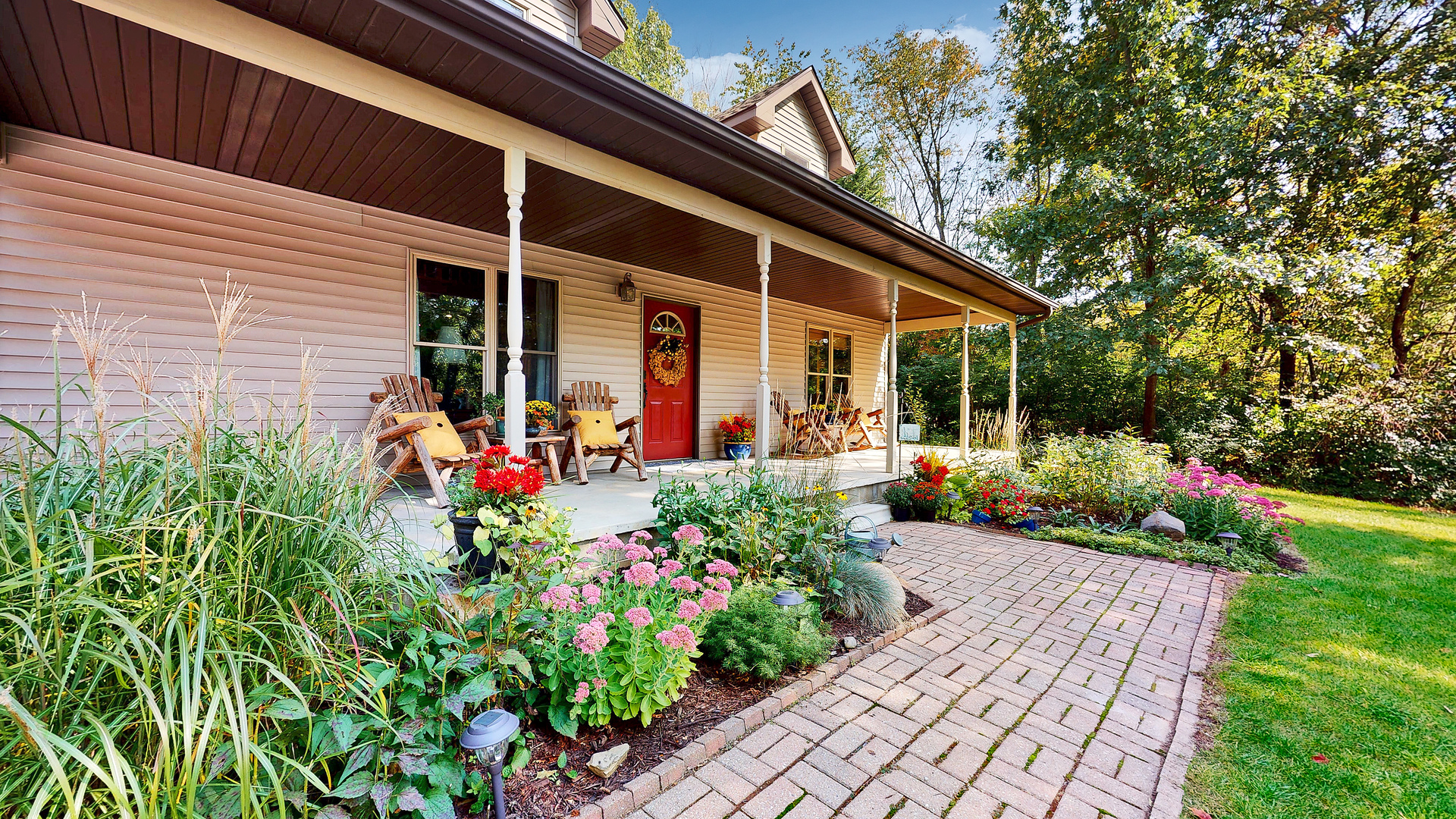 804 Kickapoo Drive Danvers, IL 61732 - Photo 9 of 33 a view of a house with flower garden