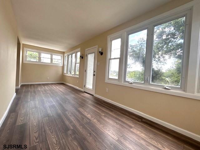 2 Creek Road Absecon, NJ 08201 - Photo 11 of 24 a view of empty room with wooden floor and fan