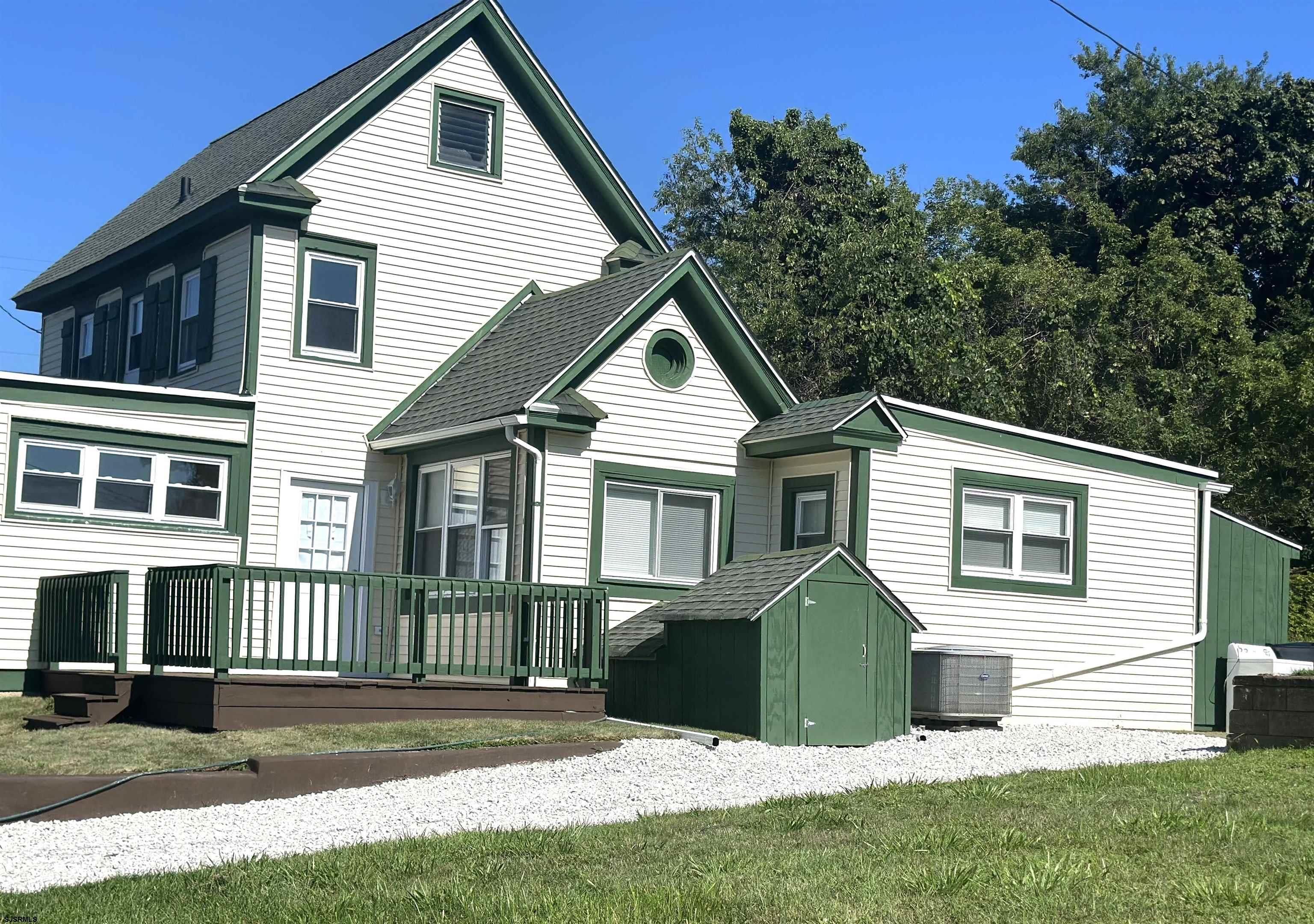 2 Creek Road Absecon, NJ 08201 - Photo 6 of 24 a front view of a house with a yard