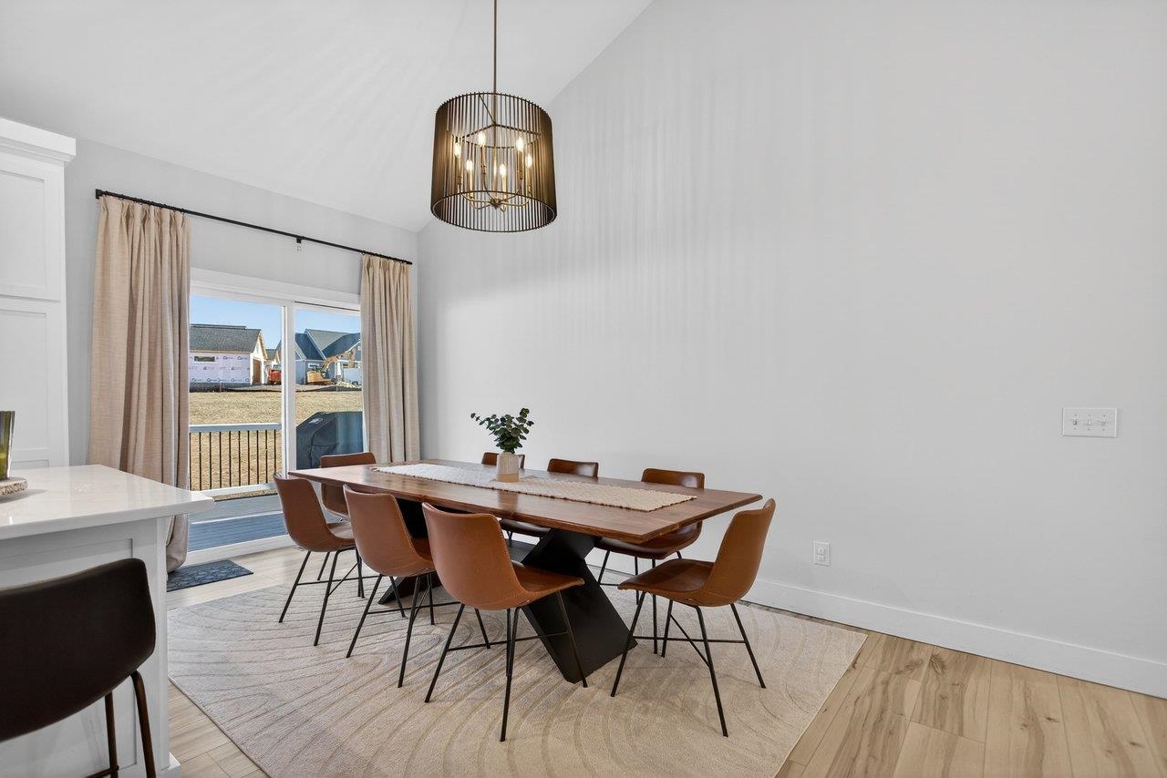 475 Beauford Road Harrisonburg, VA 22801 - Photo 23 of 75 a view of a dining room with furniture wooden floor and chandelier