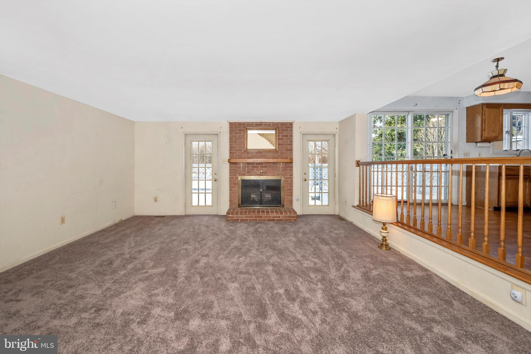 107 Fairview Avenue Frederick, MD 21701 - Photo 19 of 53 Unstaged family room with gas fireplace