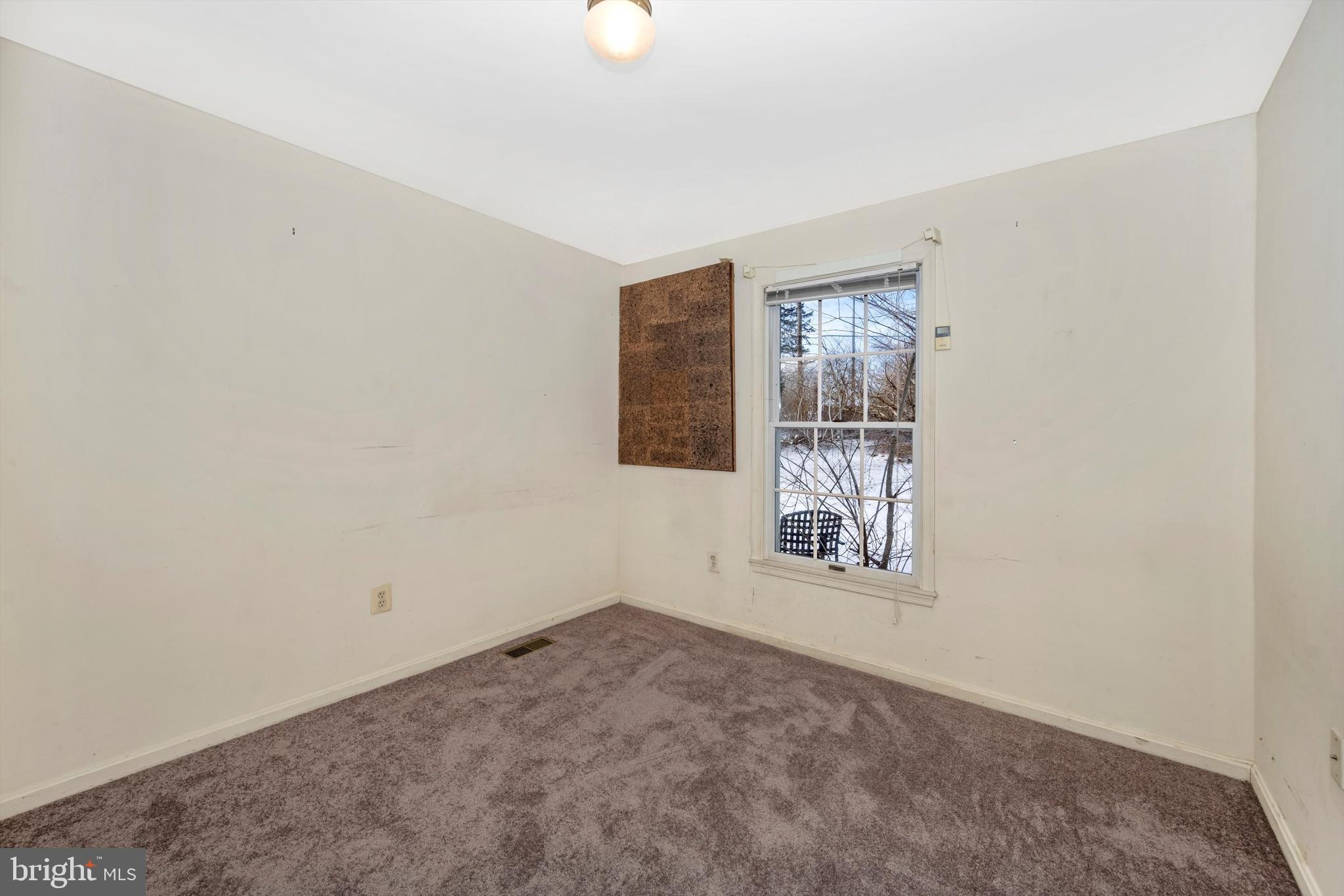 107 Fairview Avenue Frederick, MD 21701 - Photo 22 of 53 Main level bedroom 5 unstaged