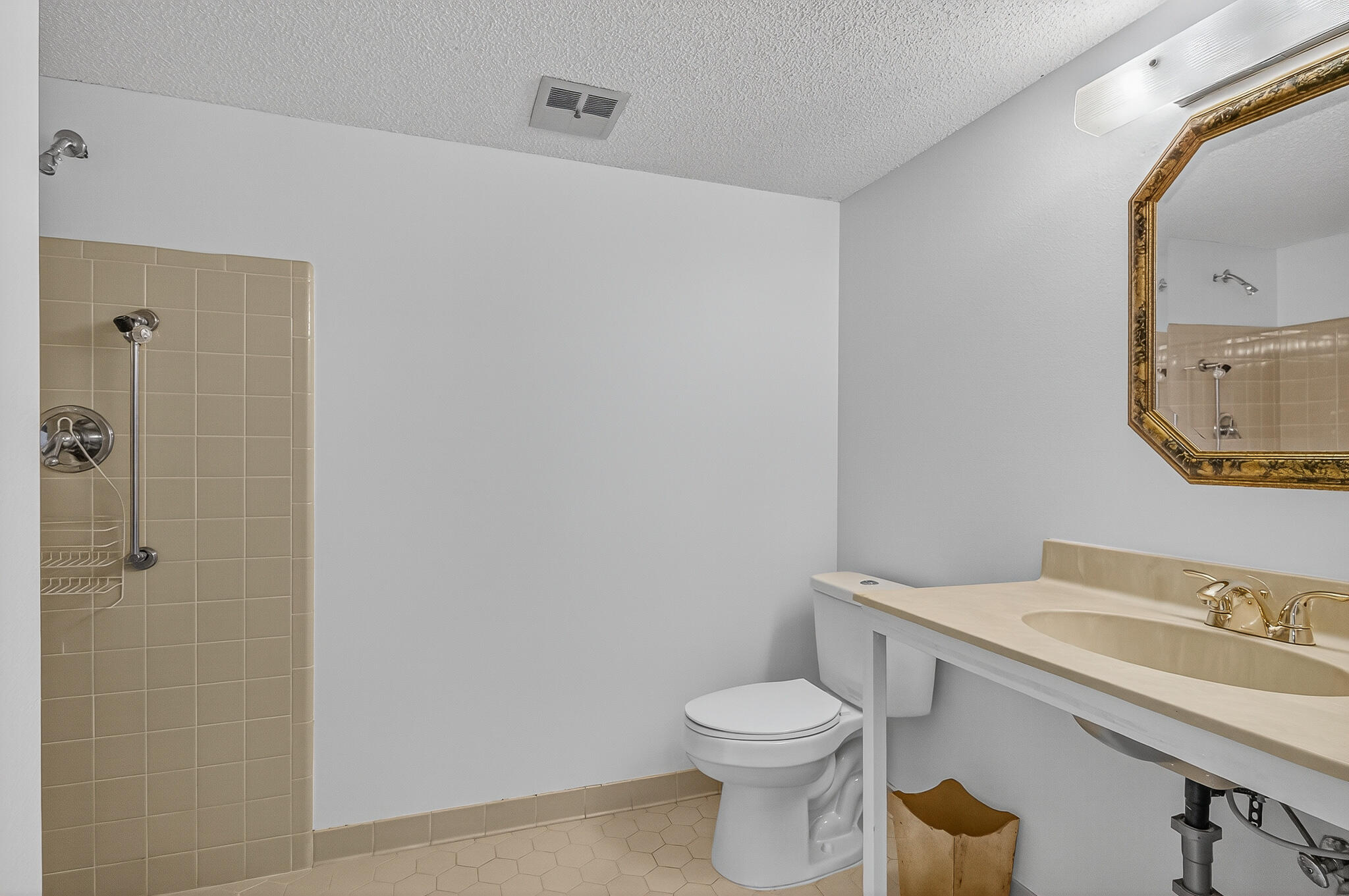 96 Yacht Club Drive, Unit 1 Fort Walton Beach, FL 32548 - Photo 14 of 43 a bathroom with a sink a toilet and shower