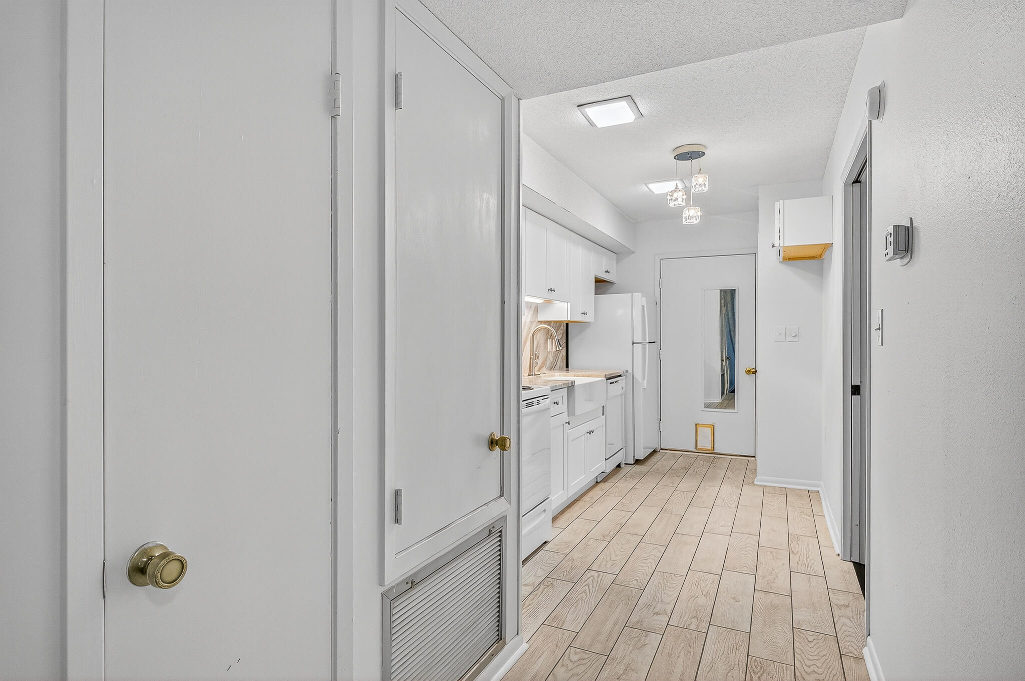 96 Yacht Club Drive, Unit 1 Fort Walton Beach, FL 32548 - Photo 17 of 43 a view of a hallway with wooden floor