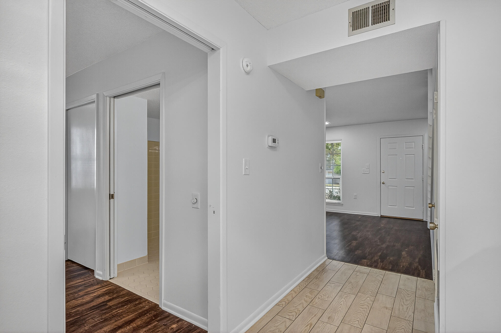 96 Yacht Club Drive, Unit 1 Fort Walton Beach, FL 32548 - Photo 24 of 43 a view of a hallway with wooden floor