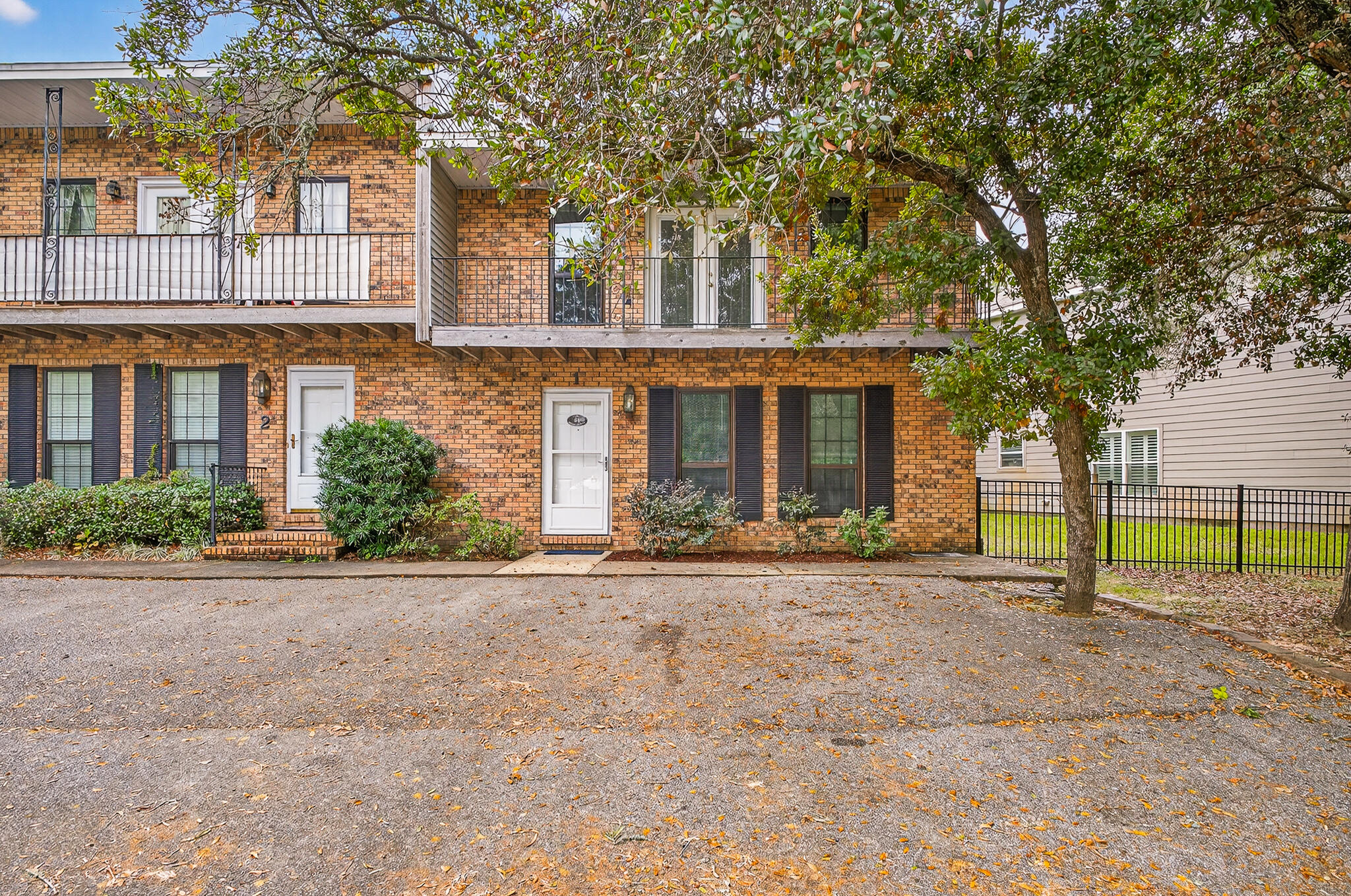 96 Yacht Club Drive, Unit 1 Fort Walton Beach, FL 32548 - Photo 3 of 43 a house view with a garden space