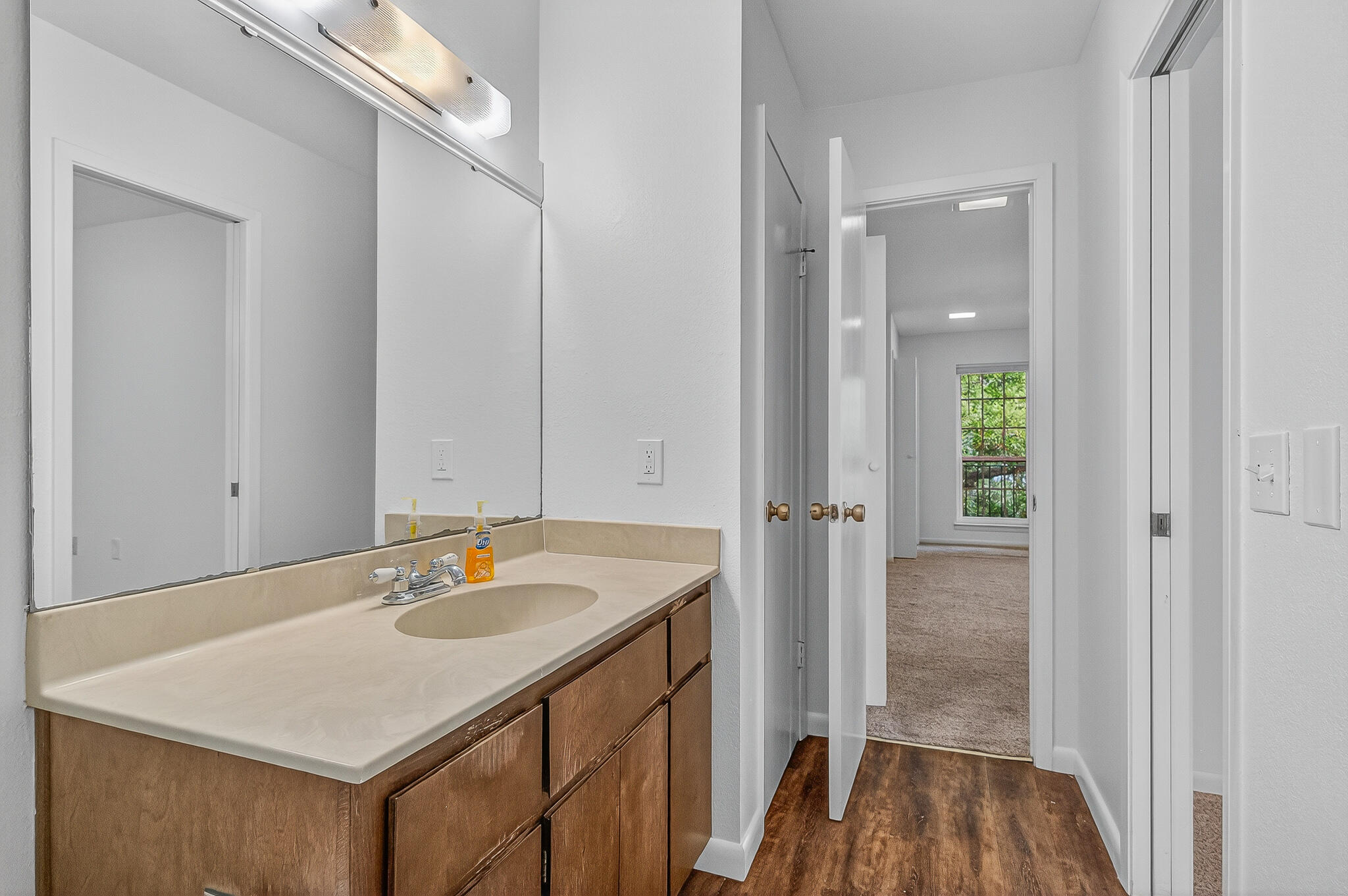 96 Yacht Club Drive, Unit 1 Fort Walton Beach, FL 32548 - Photo 35 of 43 a bathroom with a sink vanity and a mirror