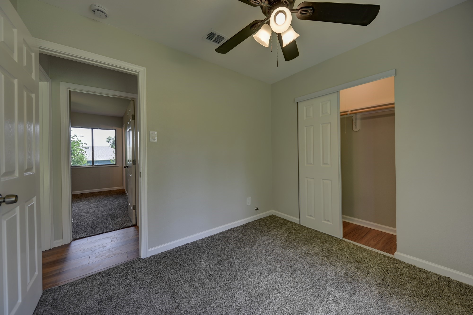 806 West Jefferson Street Brenham, TX 77833 - Photo 17 of 20 an empty room with a empty space and a ceiling fan