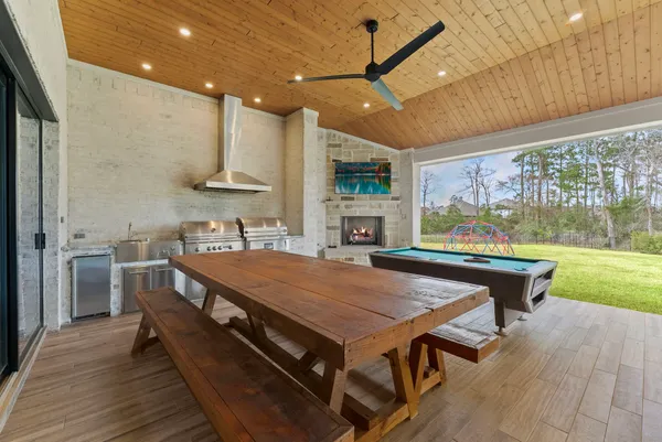 an aerial view of residential house with swimming pool