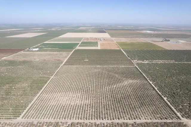a view of a swimming pool with an outdoor space and seating area