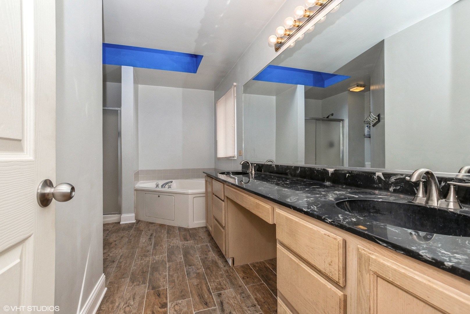 320 Danielle Road Matteson, IL 60443 - Photo 12 of 25 a bathroom with a double vanity sink and mirror