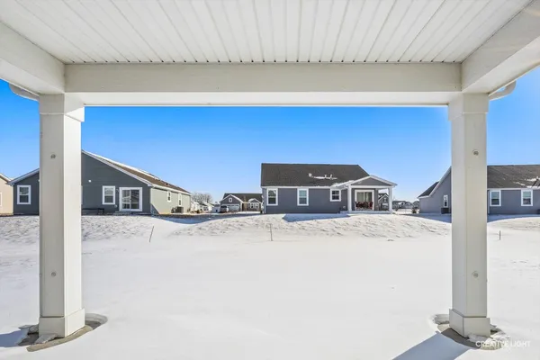 a view of a car park in front of a house