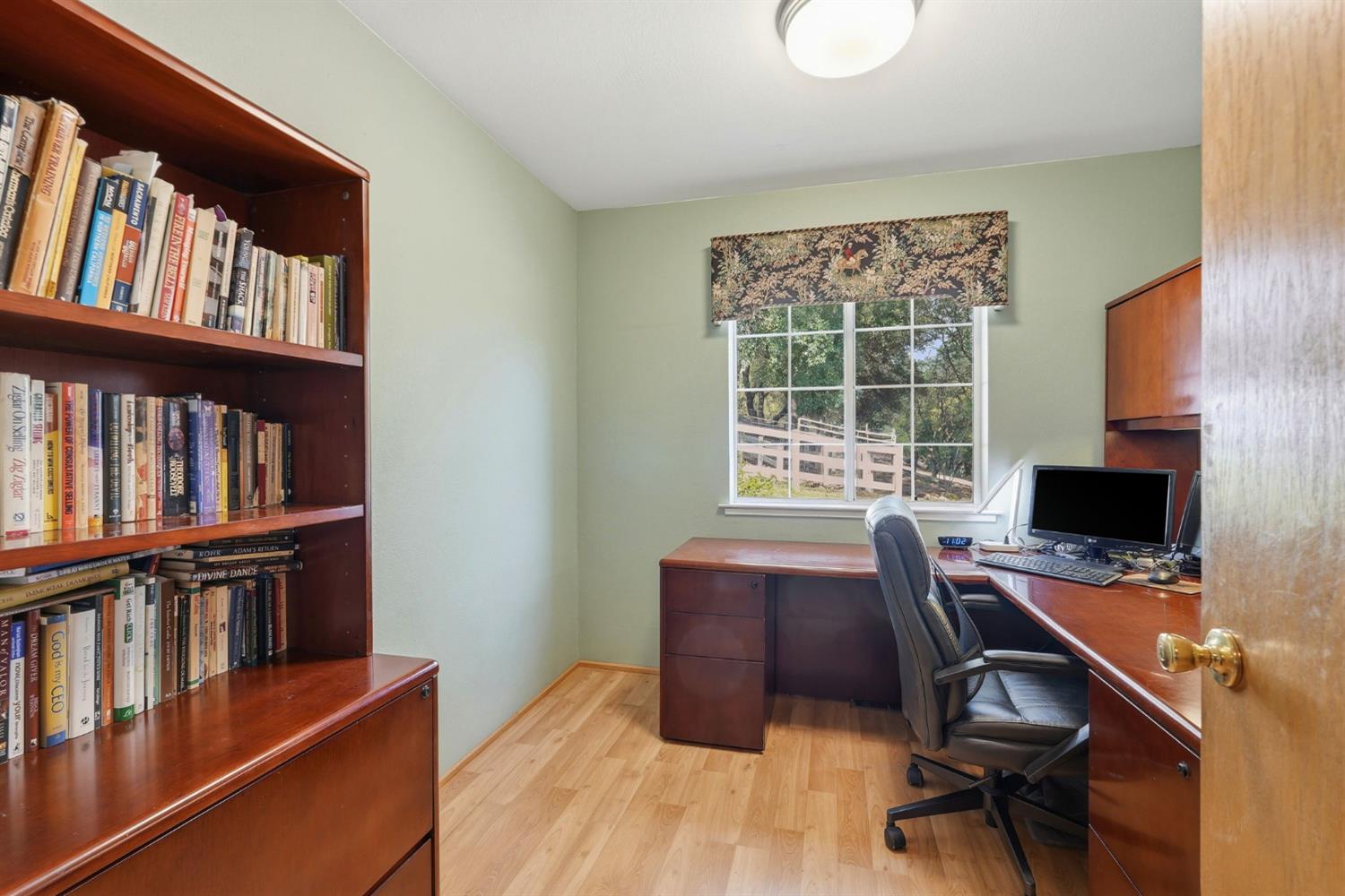 2030 Marden Drive Rescue, CA 95672 - Photo 40 of 96 a view of a workspace with furniture and a window