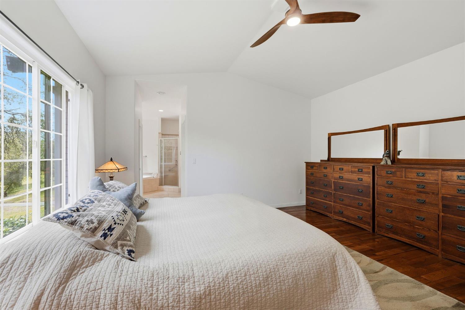 2030 Marden Drive Rescue, CA 95672 - Photo 50 of 96 a bedroom with a bed and wooden floor