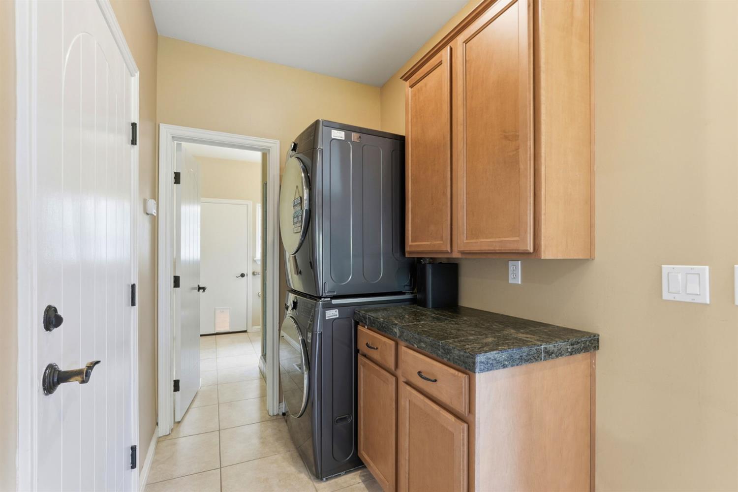 2030 Marden Drive Rescue, CA 95672 - Photo 63 of 96 a kitchen with stainless steel appliances granite countertop a refrigerator and a stove