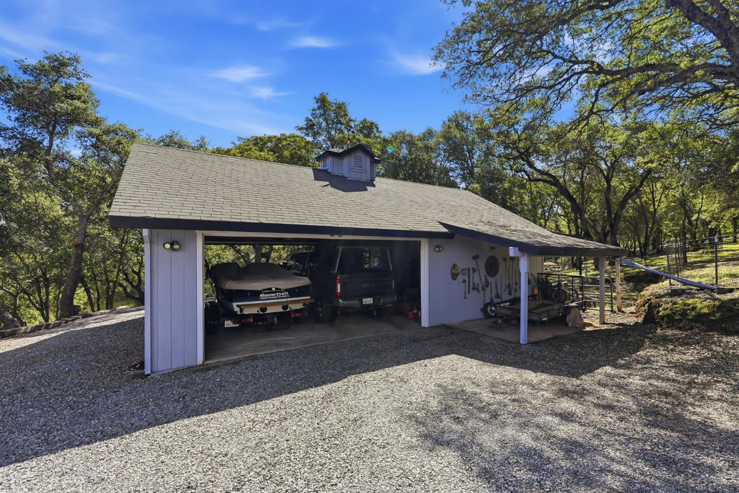 2030 Marden Drive Rescue, CA 95672 - Photo 79 of 96 a front view of a house with a yard and garage