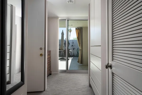 a bathroom with a double vanity sink mirror and shower