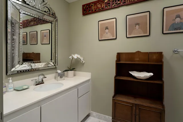 a bathroom with a shower and a toilet