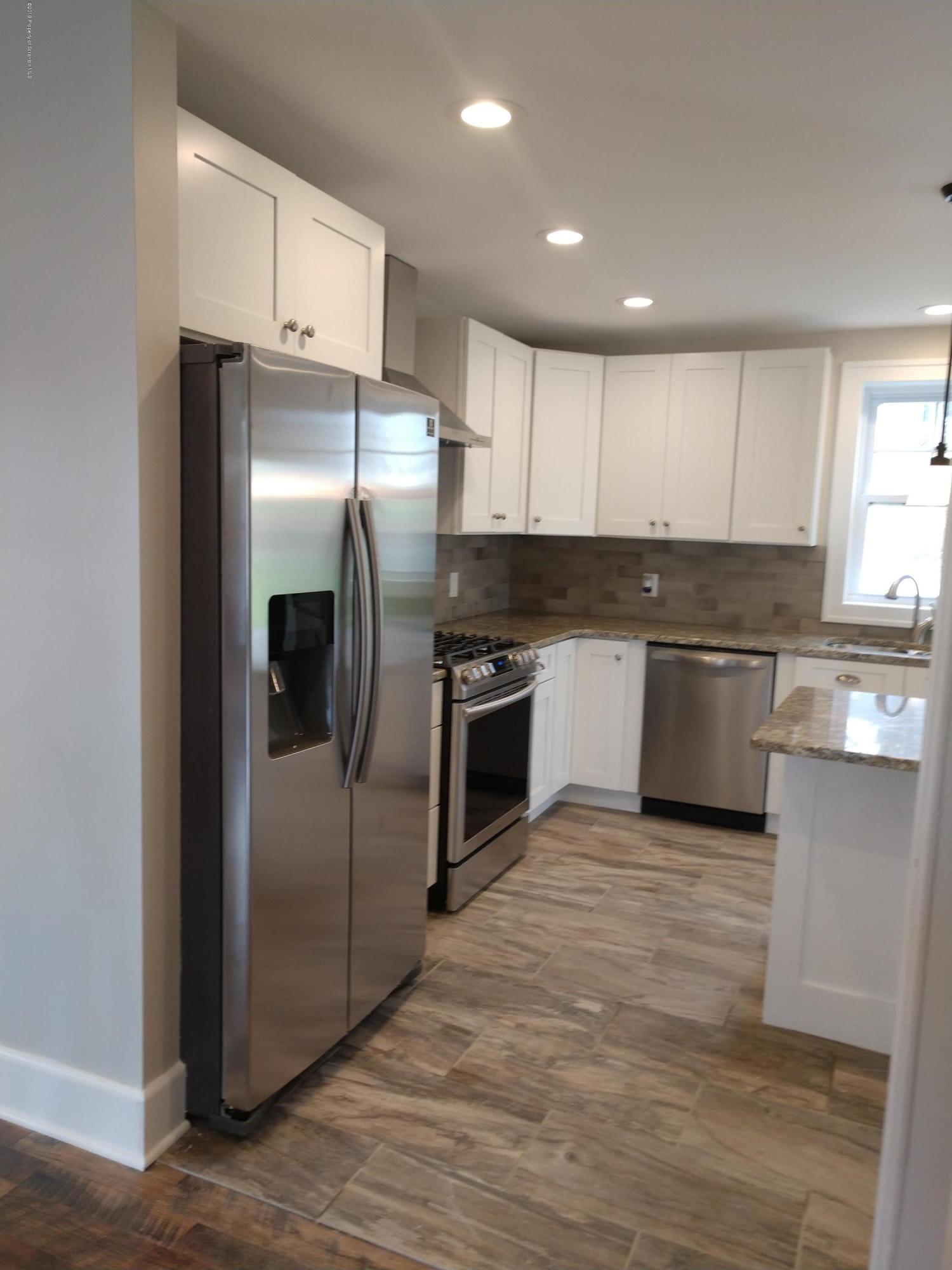 4373 State Rte 2014 Forest City, PA 18421 - Photo 10 of 32 a kitchen with stainless steel appliances granite countertop a refrigerator and a sink