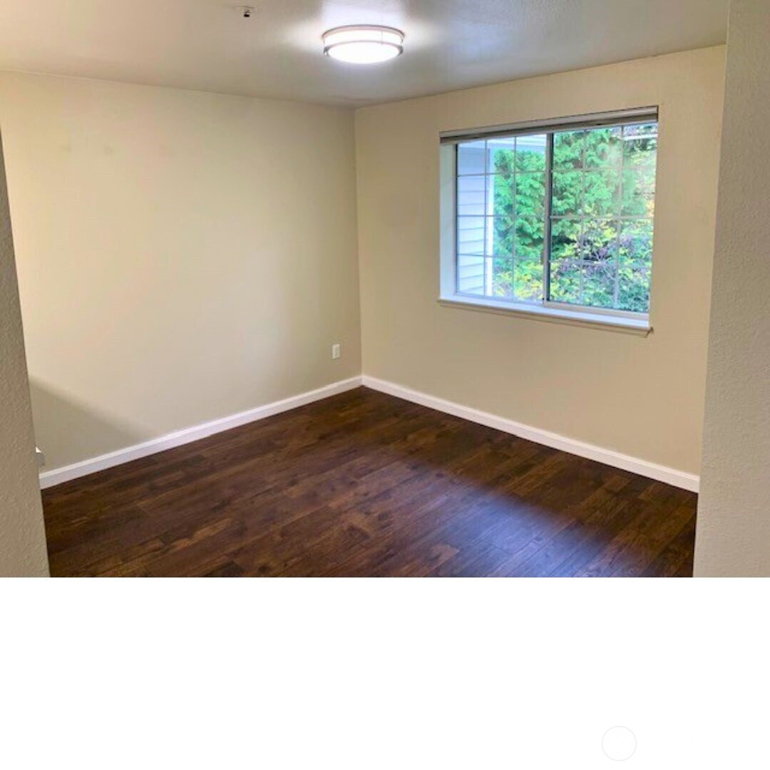 7453 Newcastle Golf Club Road, Unit A304 Newcastle, WA 98059 - Photo 14 of 19 a black and white photo of a living room
