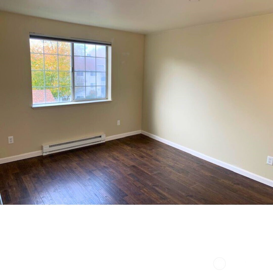 7453 Newcastle Golf Club Road, Unit A304 Newcastle, WA 98059 - Photo 16 of 19 a black and white photo of a room