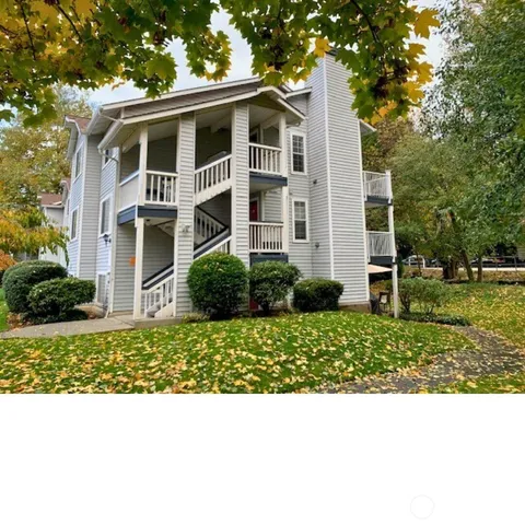 a black and white photo of a house