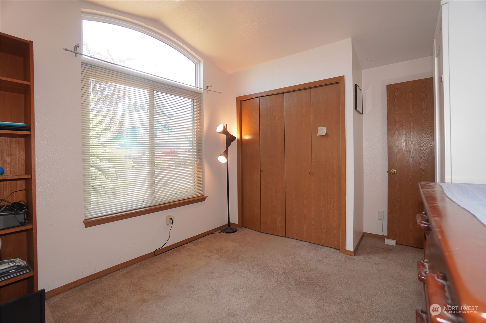 11209 Southeast 267th Place Kent, WA 98030 - Photo 18 of 31 an empty room with windows and closet