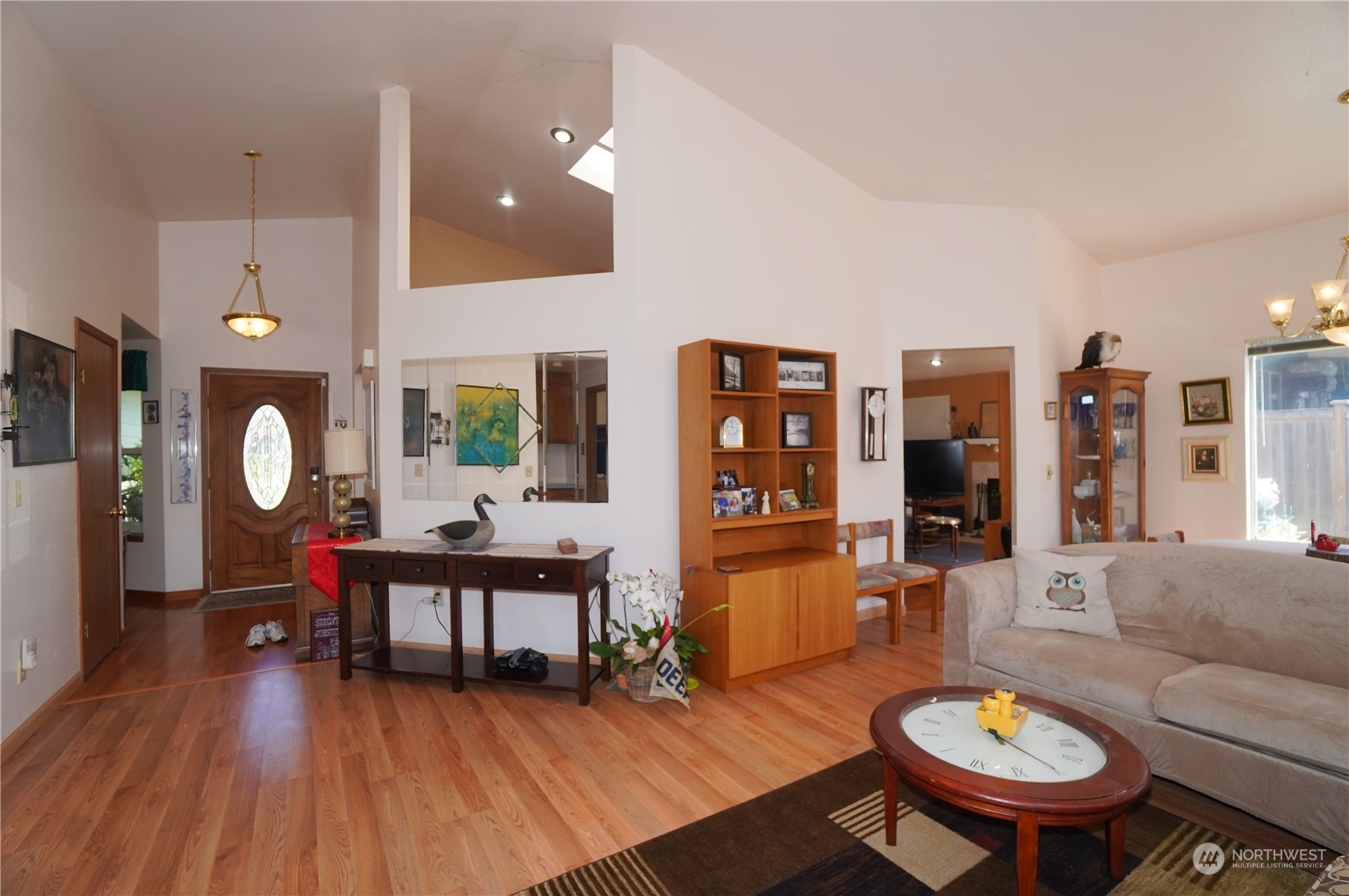11209 Southeast 267th Place Kent, WA 98030 - Photo 3 of 31 a living room with furniture and wooden floor