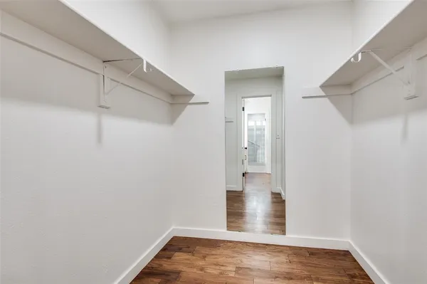 a view of small space with wooden floor