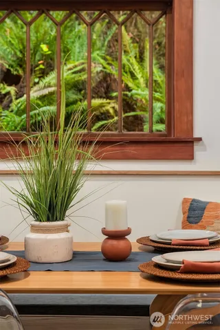 a potted plant sitting on top of a shelf