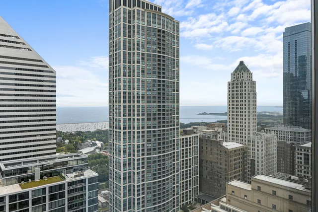 a view of a city with tall buildings