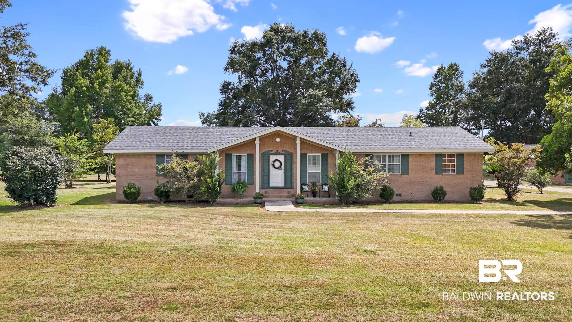 15600 Fackler Road Loxley, AL 36551 - Photo 1 of 51 Ranch-style house featuring a front lawn