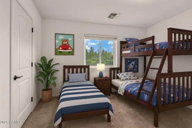 a bedroom with bed and a window