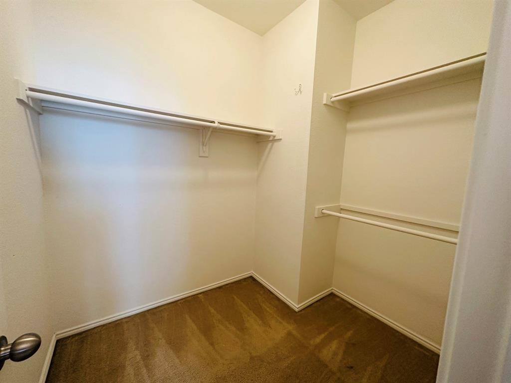 9701 Meadow Rue Drive McKinney, TX 75072 - Photo 17 of 24 a view of an empty room