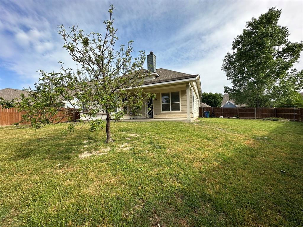 9701 Meadow Rue Drive McKinney, TX 75072 - Photo 24 of 24 a front view of house with yard
