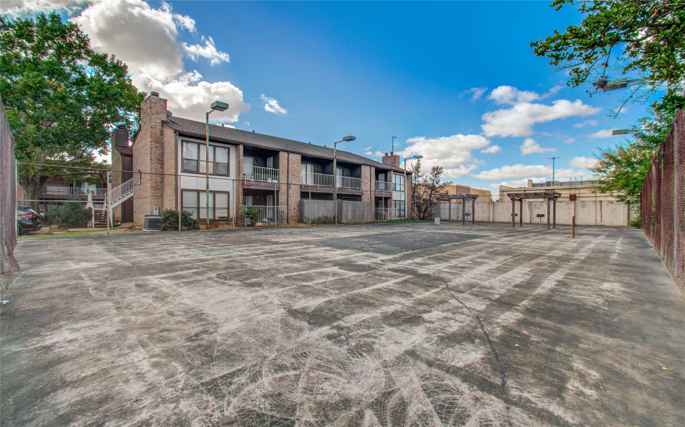 6633 West Airport Boulevard, Unit 1008 Houston, TX 77035 - Photo 2 of 8 a view of a house with a big yard