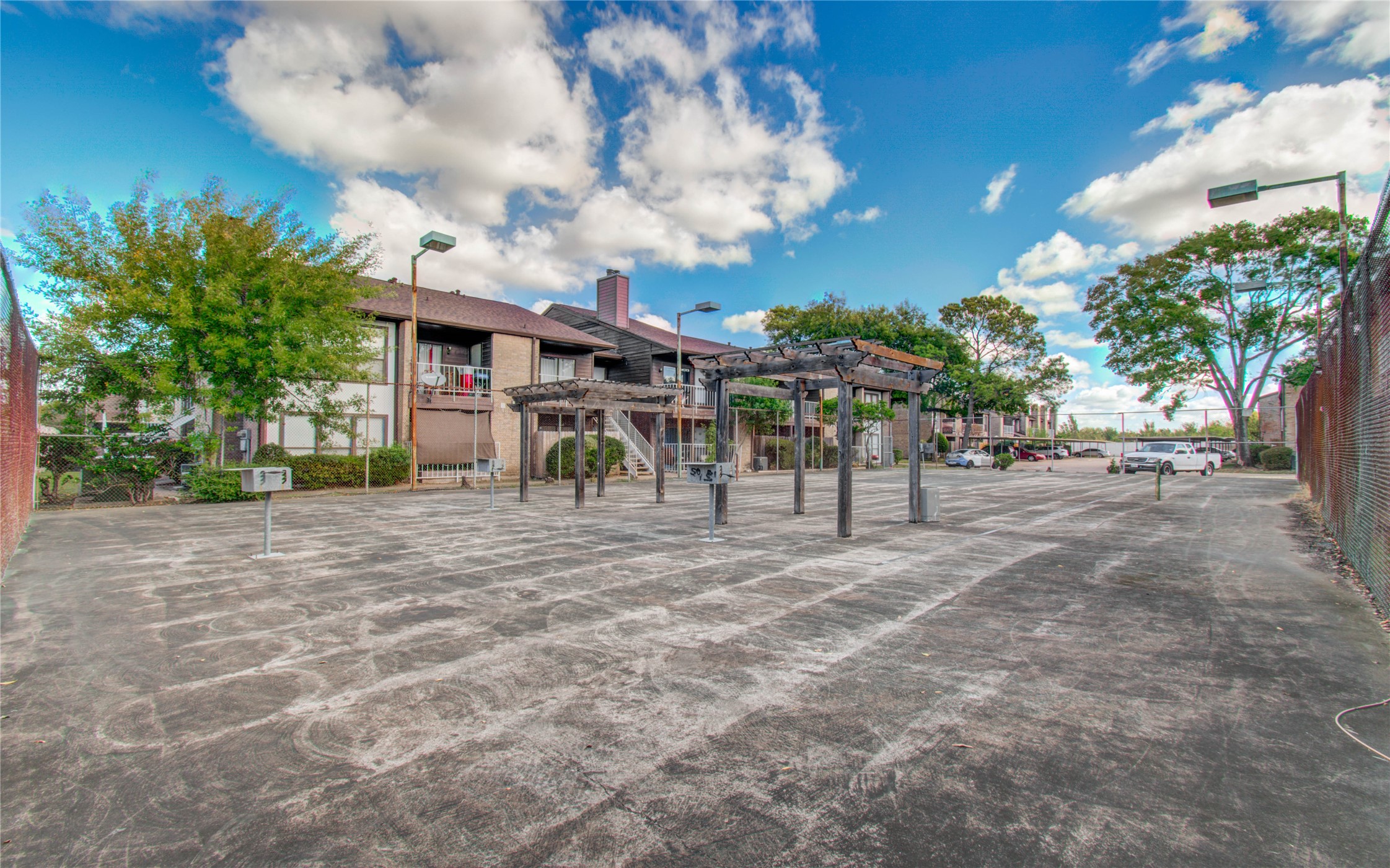 6633 West Airport Boulevard, Unit 1008 Houston, TX 77035 - Photo 3 of 8 a view of a street with a building in the background
