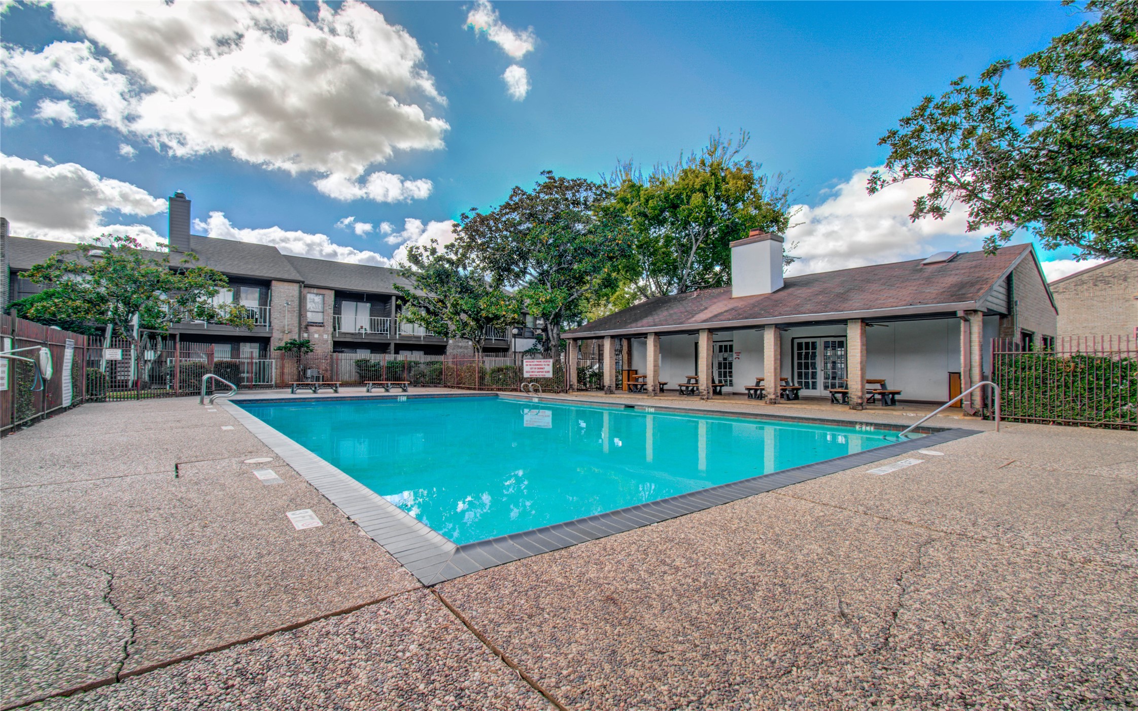 6633 West Airport Boulevard, Unit 1008 Houston, TX 77035 - Photo 5 of 8 a view of house with outdoor space and swimming pool