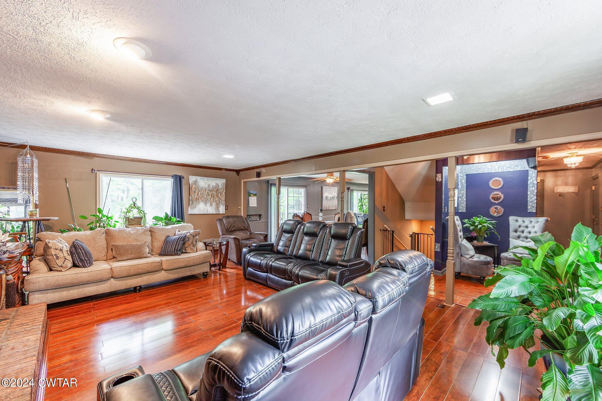 93 Lohrig Road Jackson, TN 38301 - Photo 5 of 27 a living room with furniture and a large window