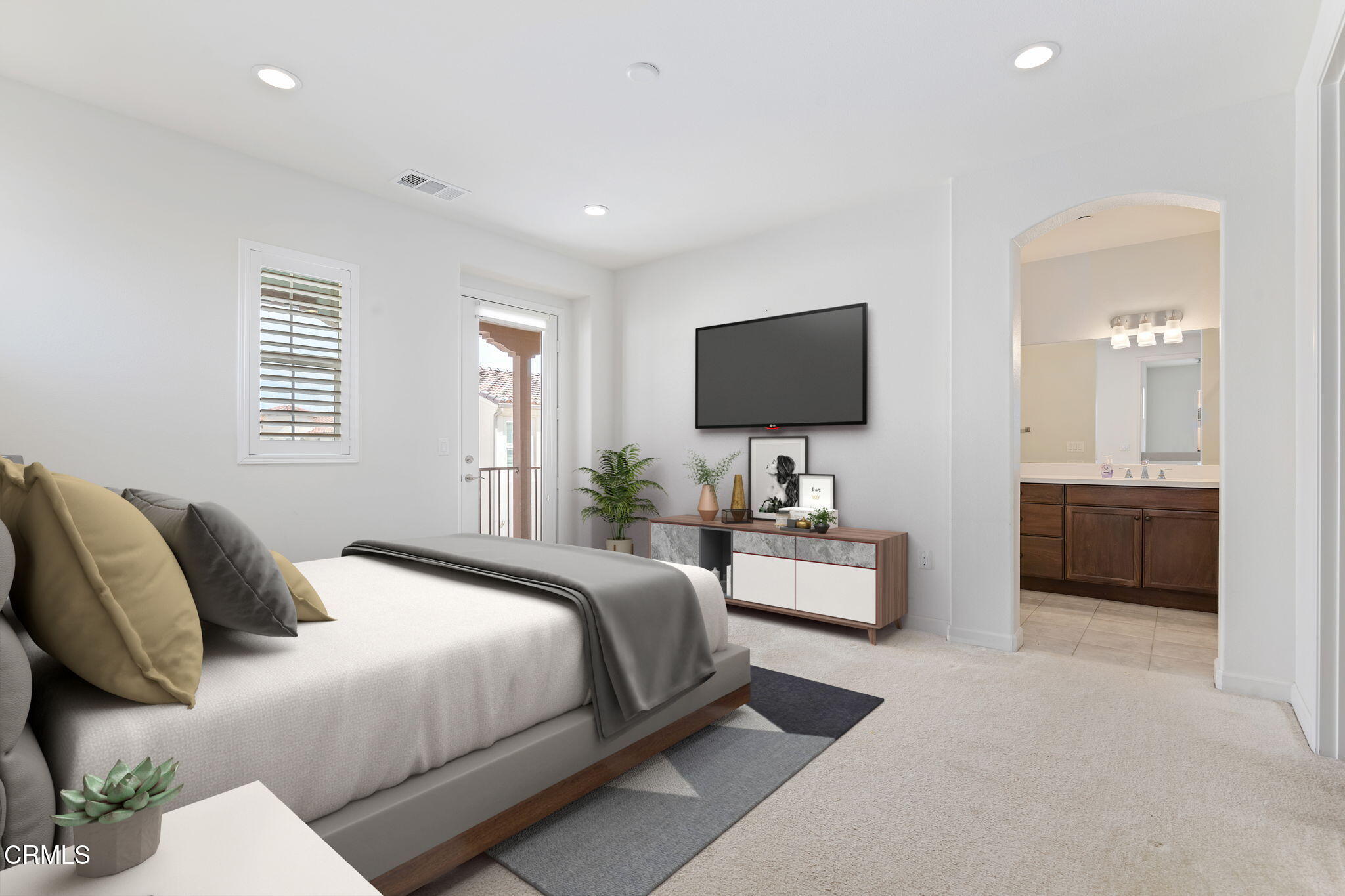 2355 Nicklaus Street Oxnard, CA 93036 - Photo 17 of 46 a bedroom with a bed and a flat screen television