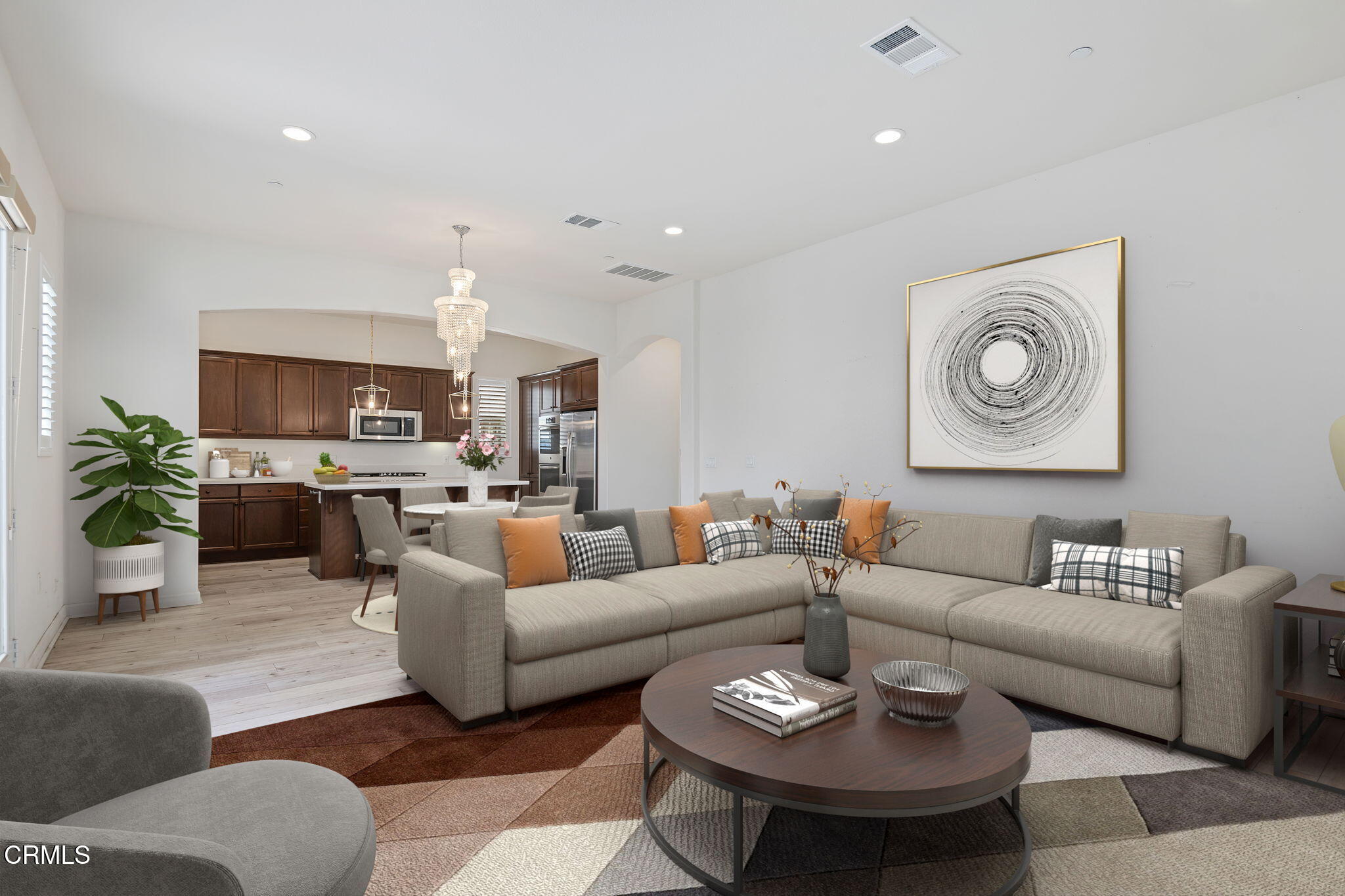 2355 Nicklaus Street Oxnard, CA 93036 - Photo 3 of 46 a living room with furniture kitchen view and wood floor