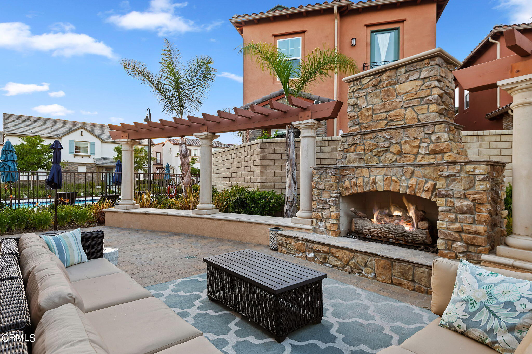 2355 Nicklaus Street Oxnard, CA 93036 - Photo 40 of 46 a view of a patio with couches and a fireplace
