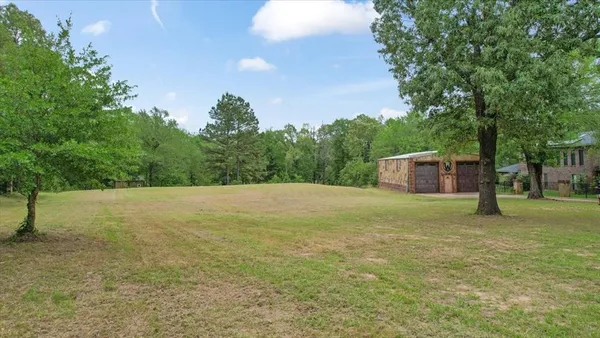 a fire hydrant in the middle of a field