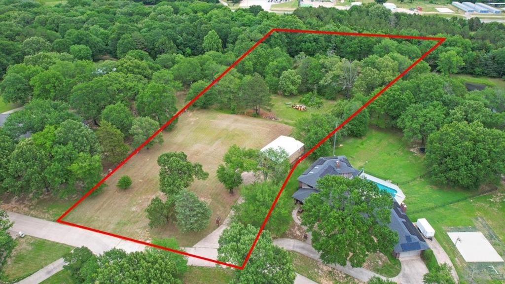 380 Timber Lakes Drive Powderly, TX 75473 - Photo 16 of 19 an aerial view of a house