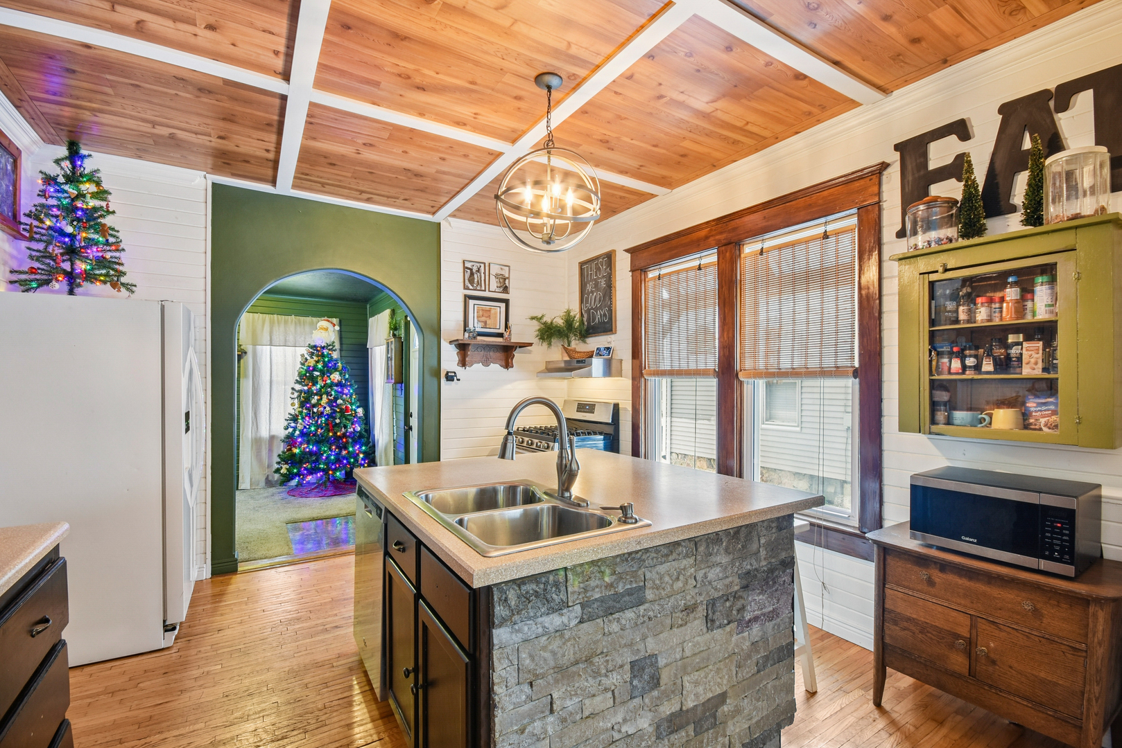 609 East Chapin Street Morris, IL 60450 - Photo 12 of 36 a kitchen with a sink stove and cabinets