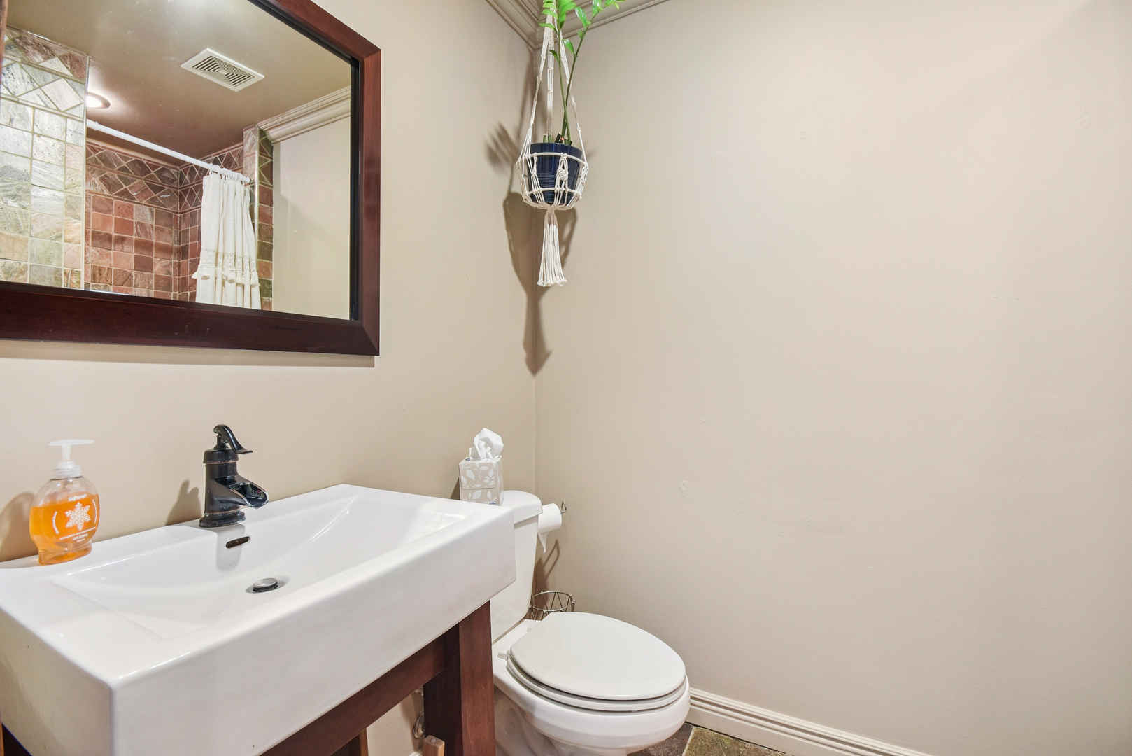 609 East Chapin Street Morris, IL 60450 - Photo 23 of 36 a bathroom with a toilet a sink and mirror