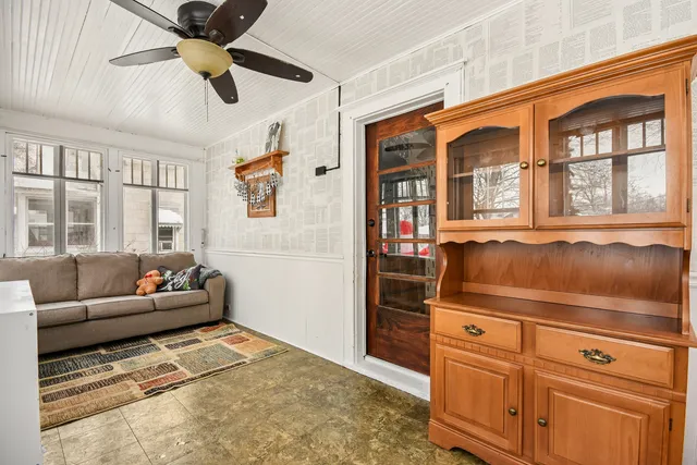 a living room with furniture and a window